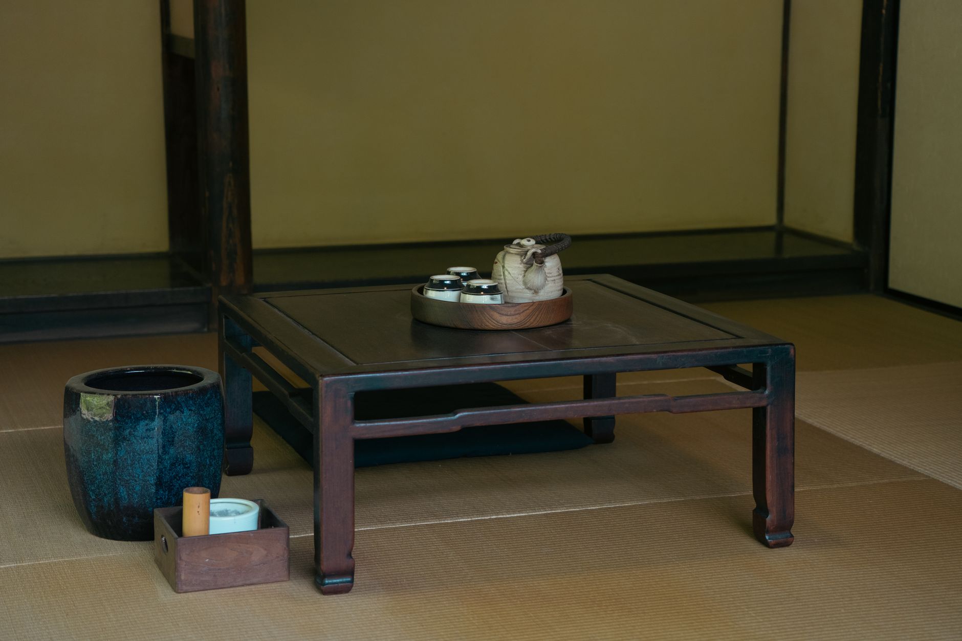 Traditional Japanese tea set with ceramics and bamboo whisk